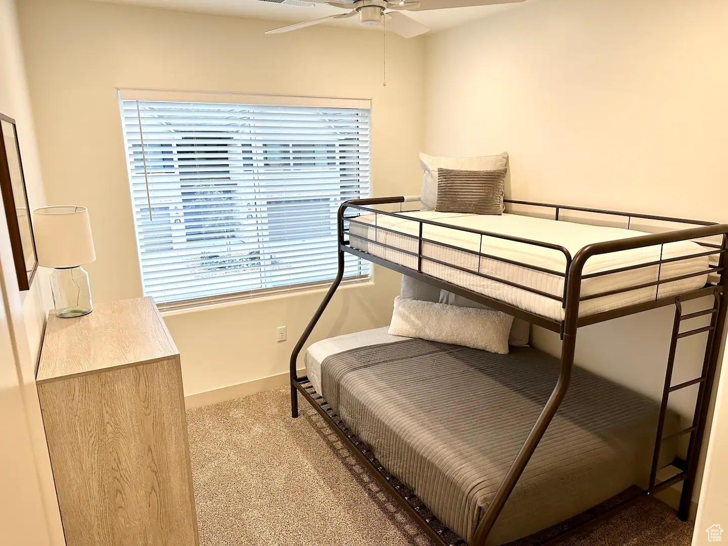 Bedroom featuring carpet floors and ceiling fan