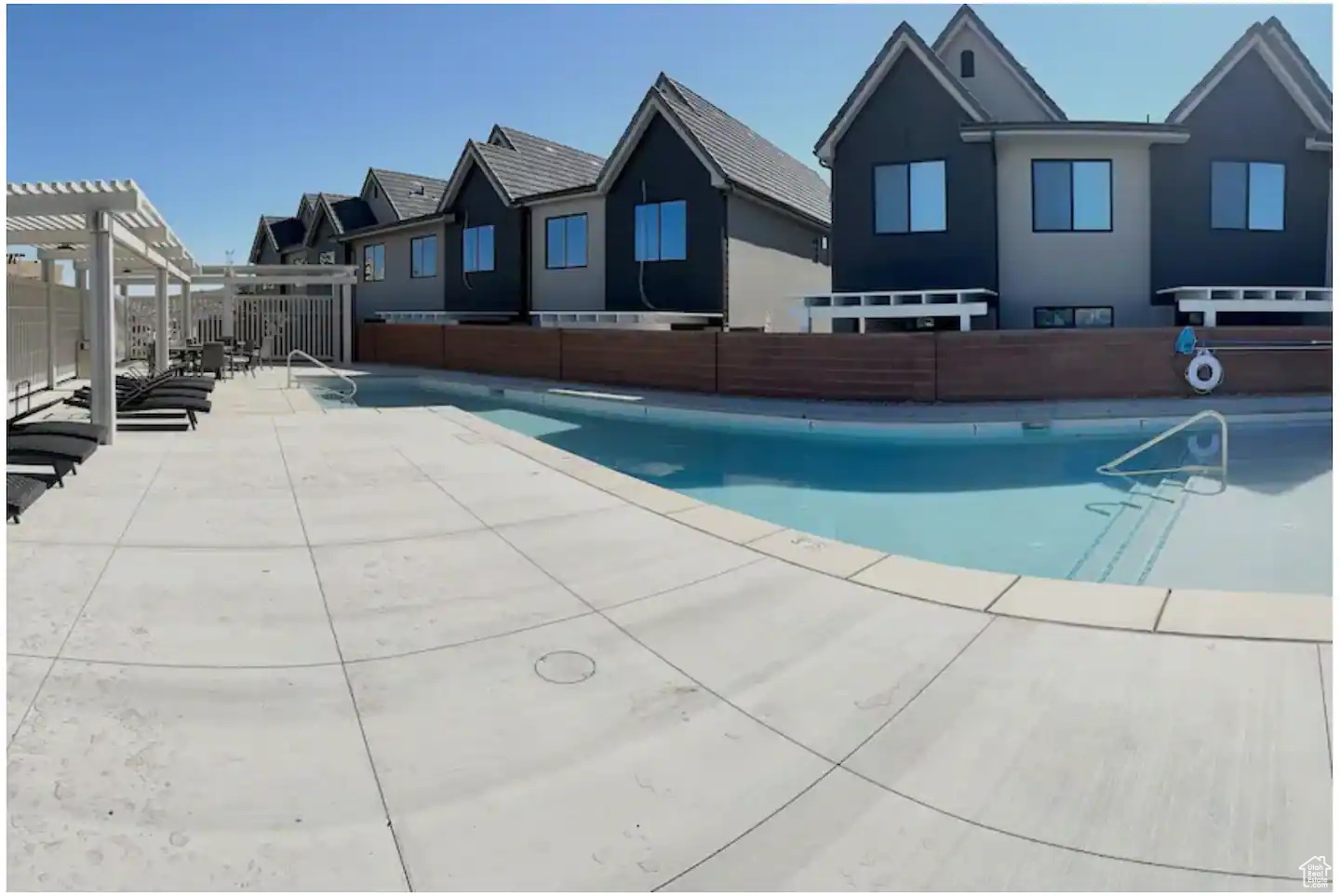 View of pool featuring a pergola and a patio