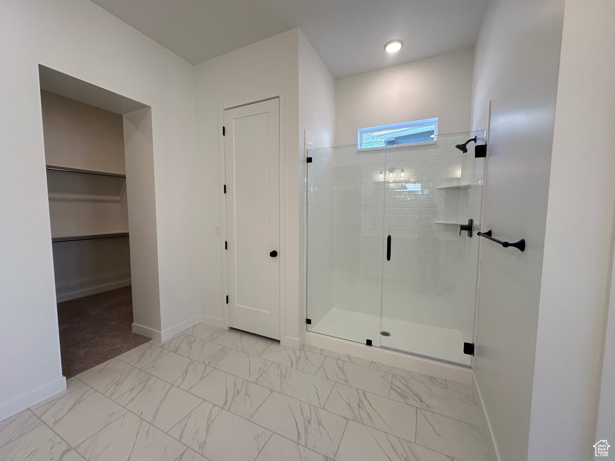 Bathroom featuring walk in shower