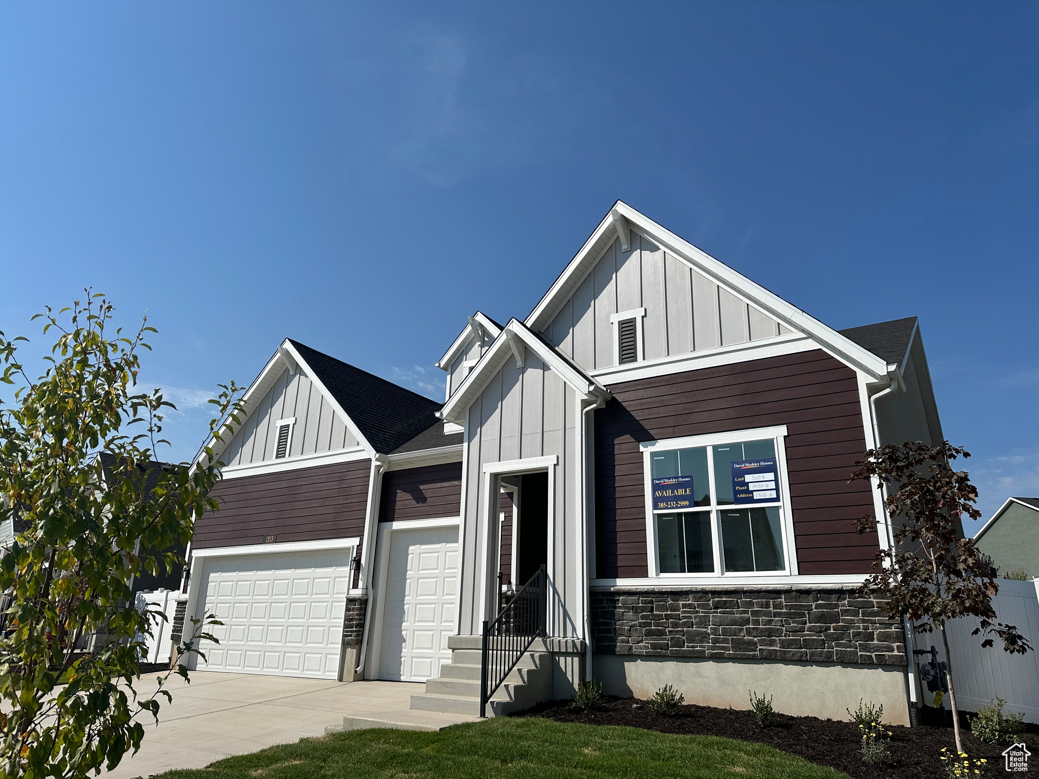 View of front of property featuring a garage