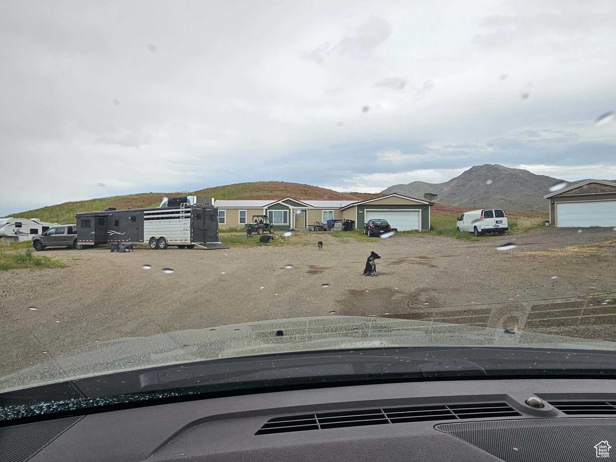 Exterior space featuring a garage and a mountain view