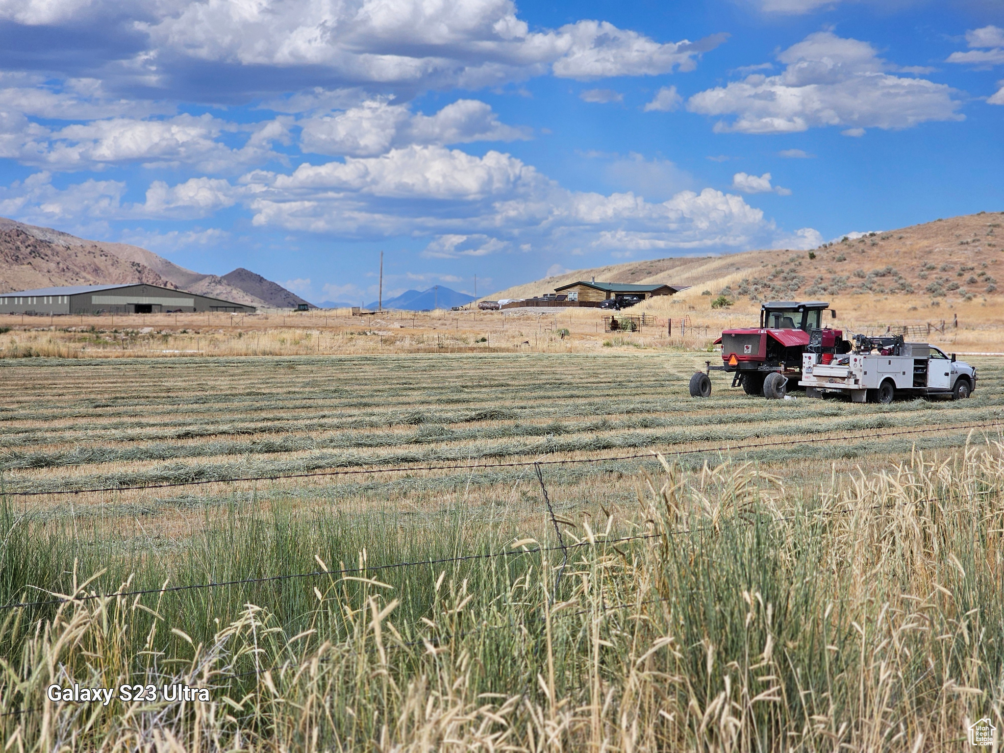 Hay baler, looking North/East. over north 40 Acres