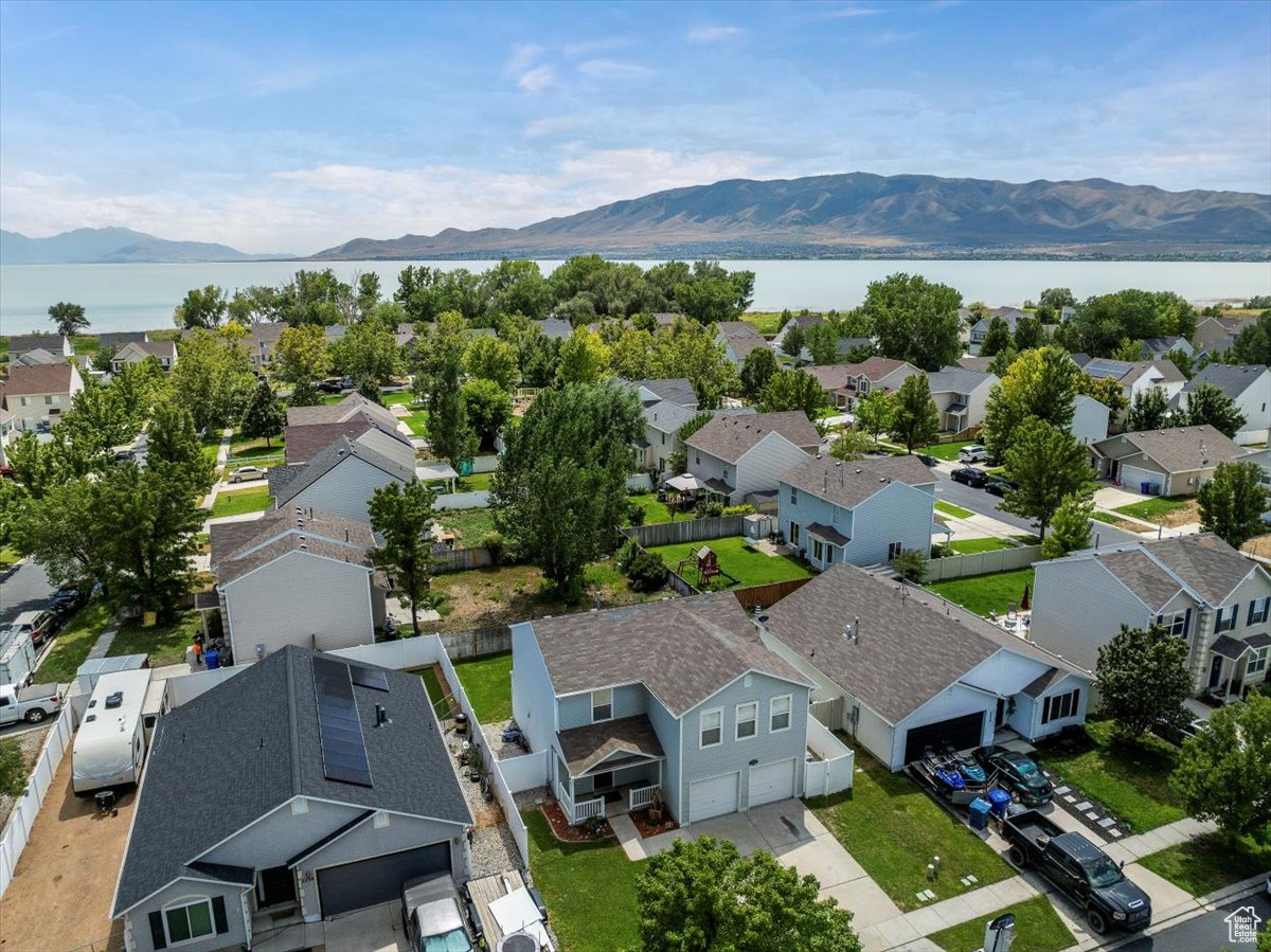 Bird's eye view with a water and mountain view