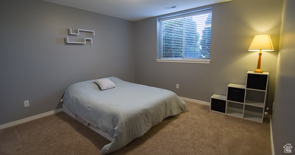 View of carpeted bedroom