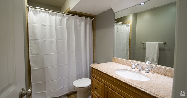 Bathroom with vanity and toilet