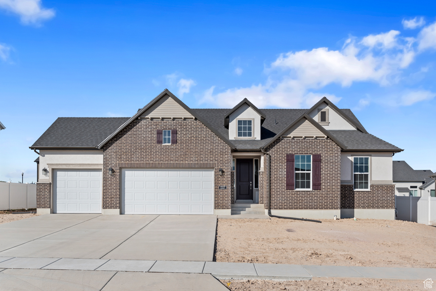 View of front of property with a garage