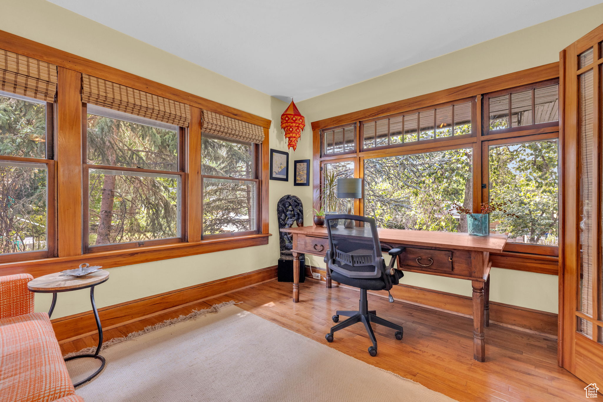 Office space featuring light hardwood / wood-style flooring and plenty of natural light