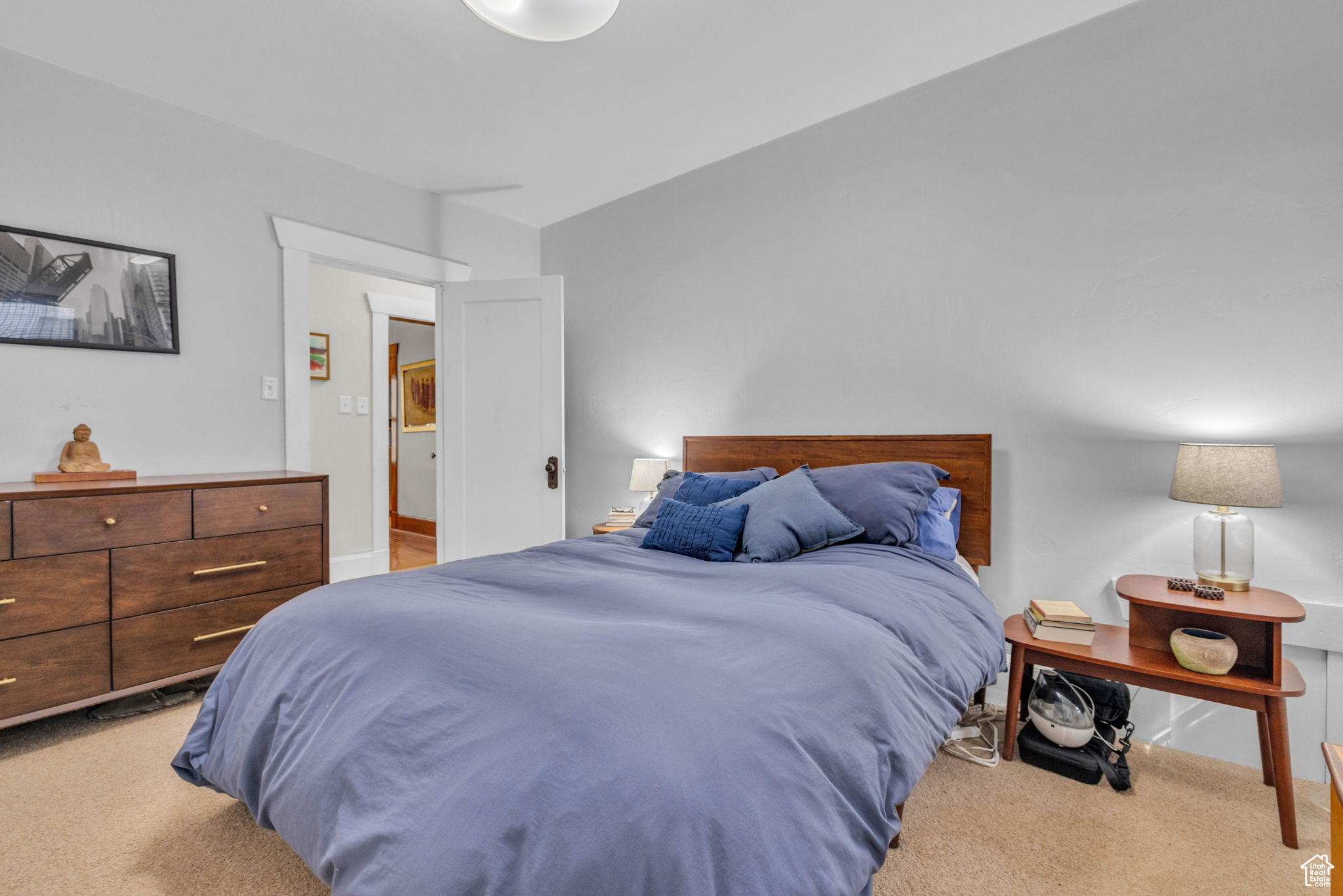 Bedroom with light carpet