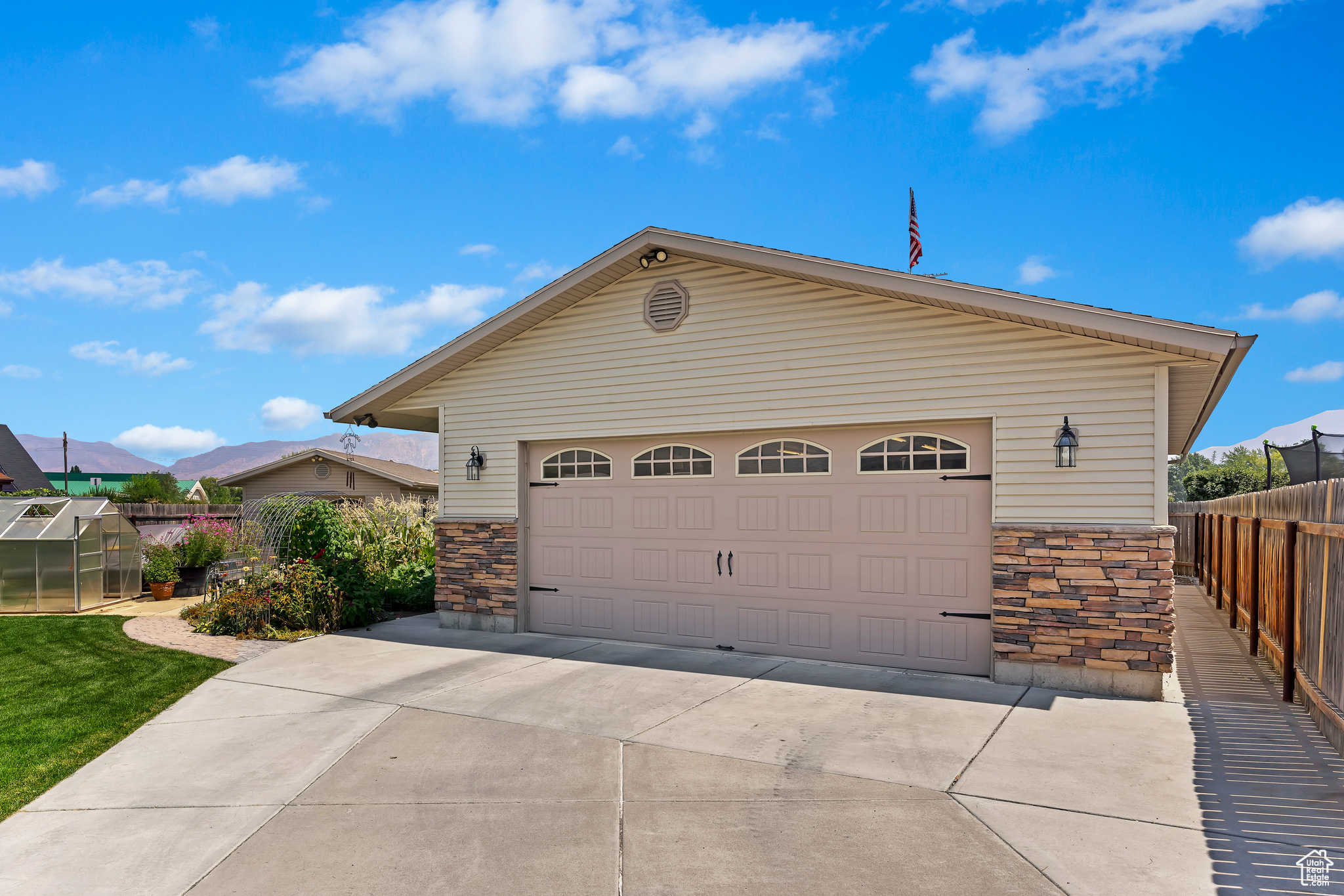 View of front of property with a garage