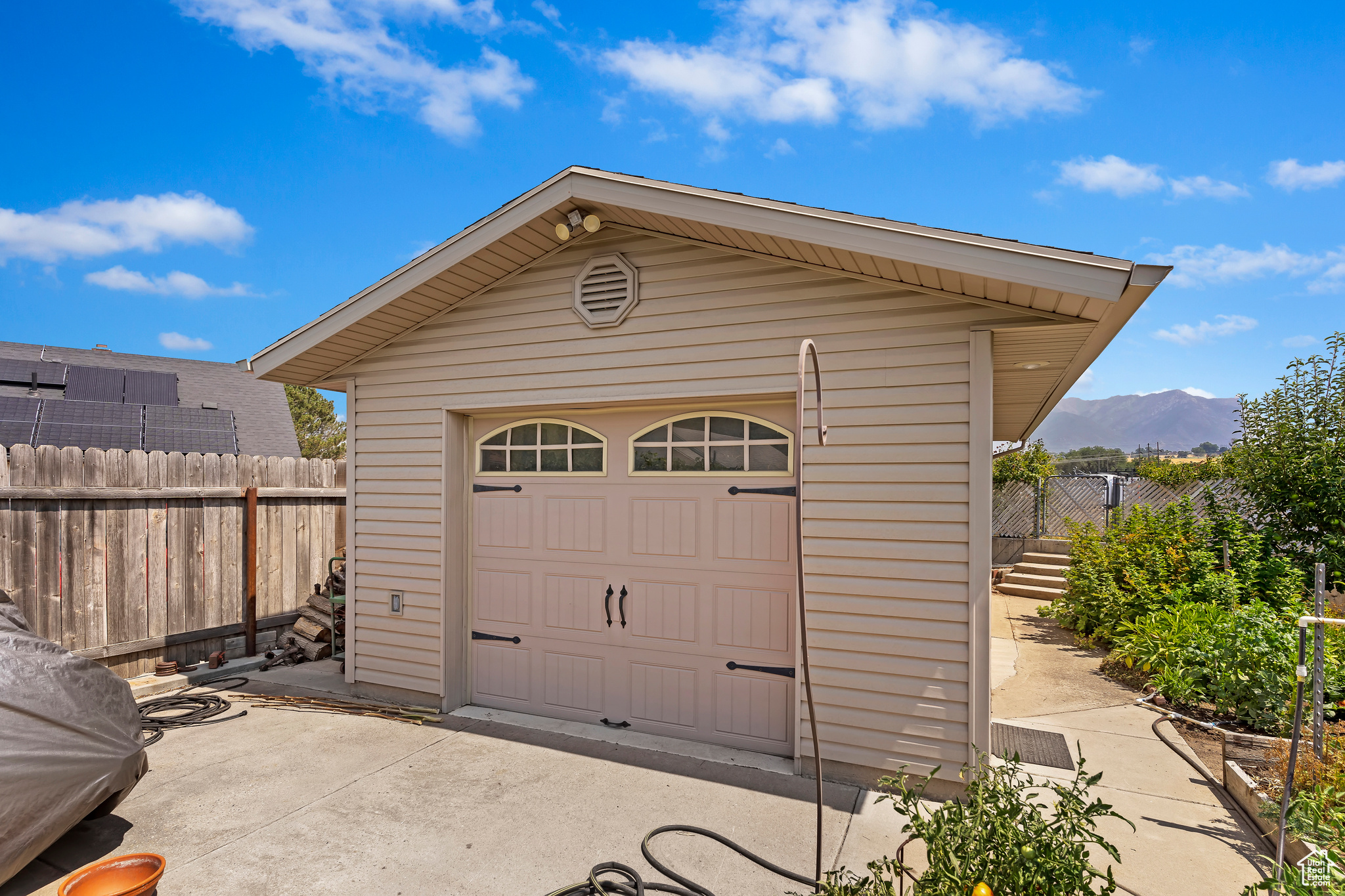 Garage featuring a mountain view