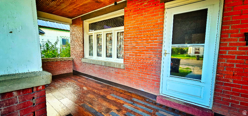 Entrance to property with a porch