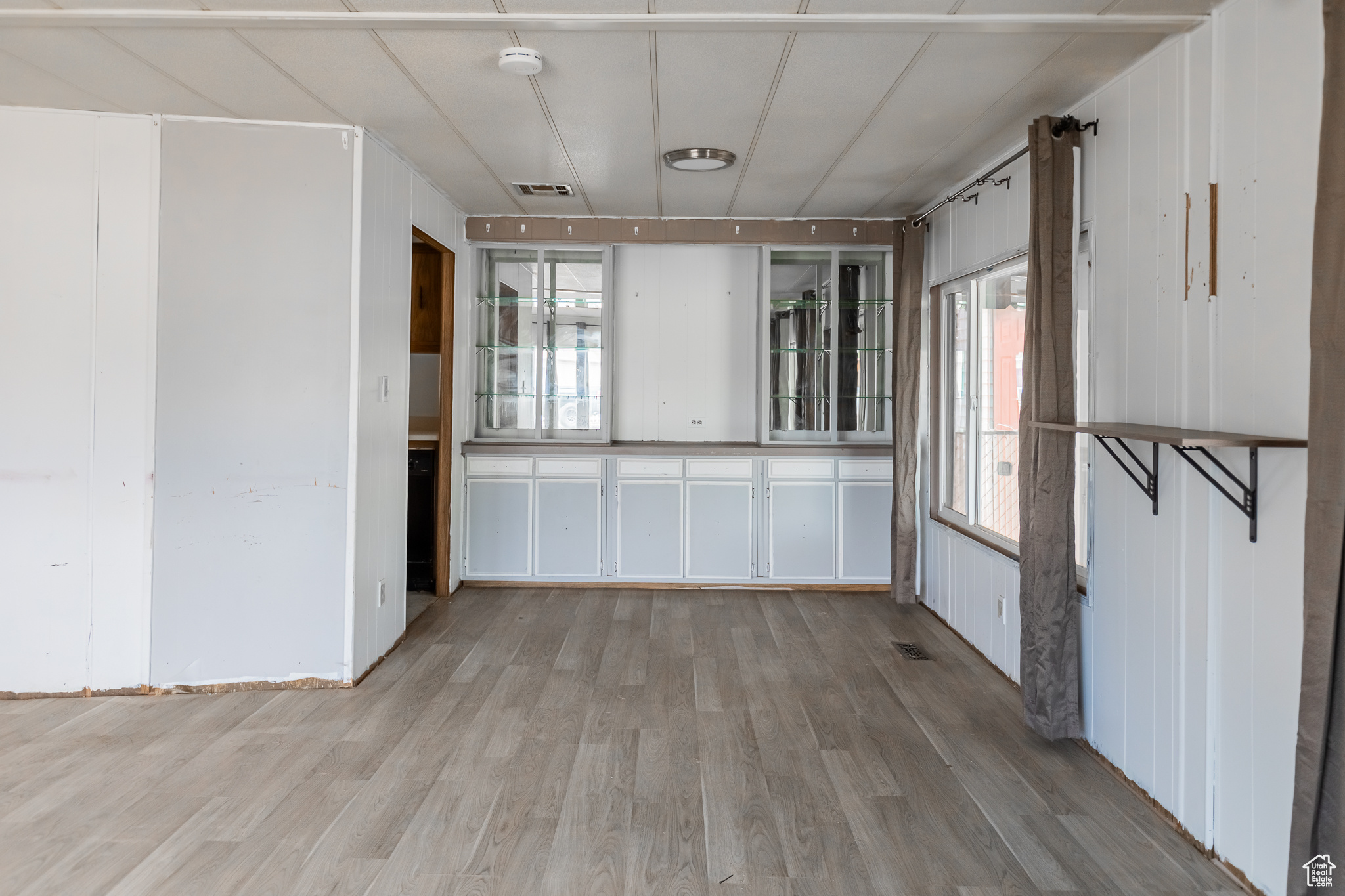 Spare room featuring hardwood / wood-style flooring