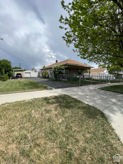 View of front of house with a front lawn