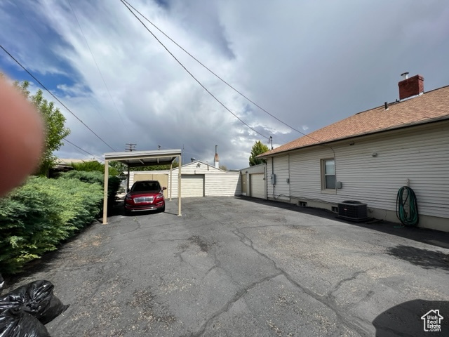 View of car parking with a carport