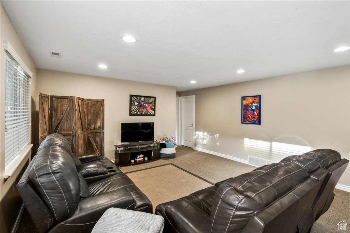 Living room featuring carpet flooring