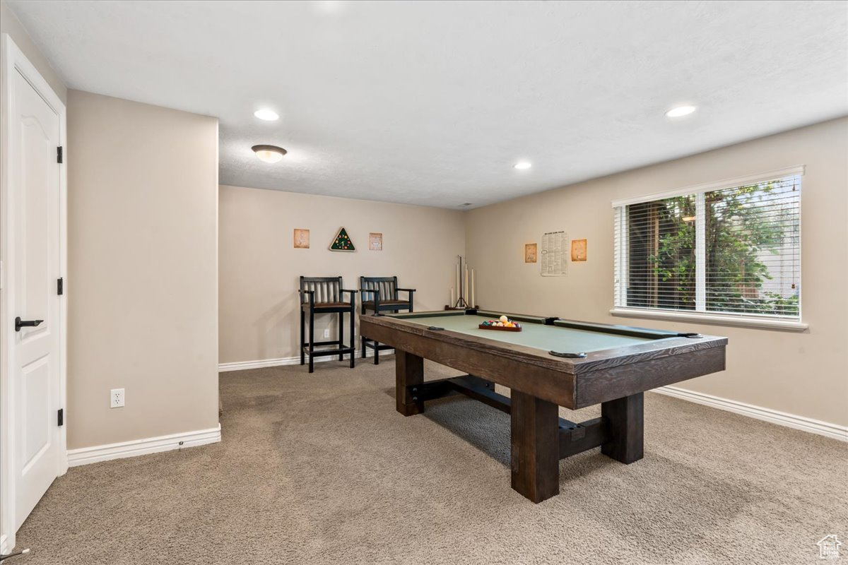 Recreation room featuring billiards and carpet flooring