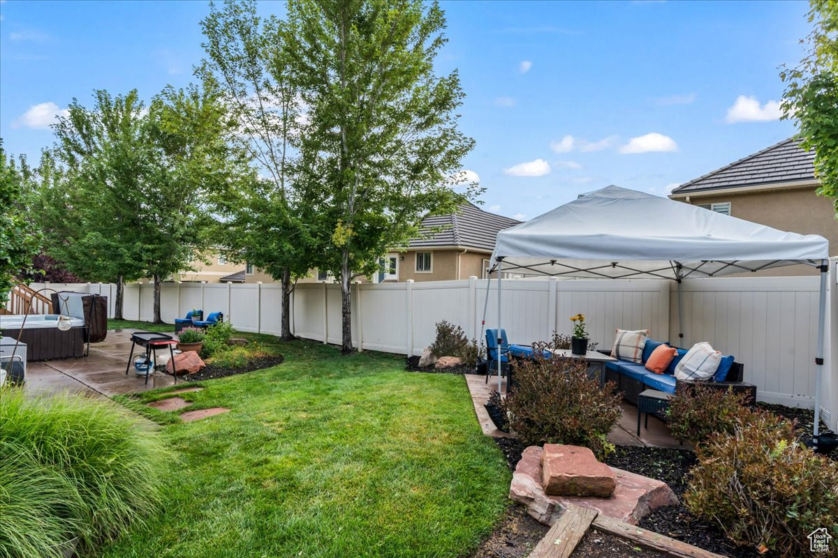 View of yard with a patio and outdoor lounge area