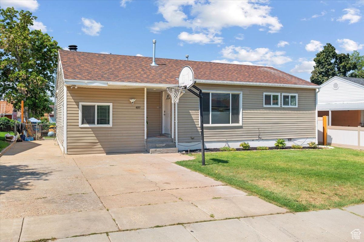 View of front of house with a front lawn