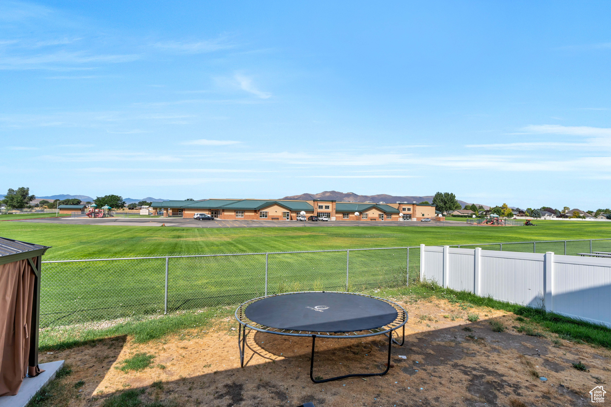 View of yard with a trampoline