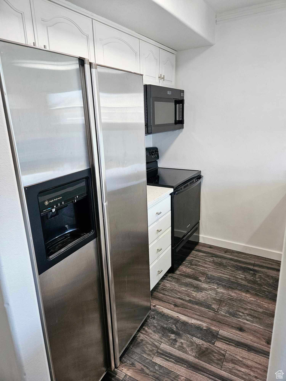 update kitchen with brand new dishwasher, quartz countertops and new flooring