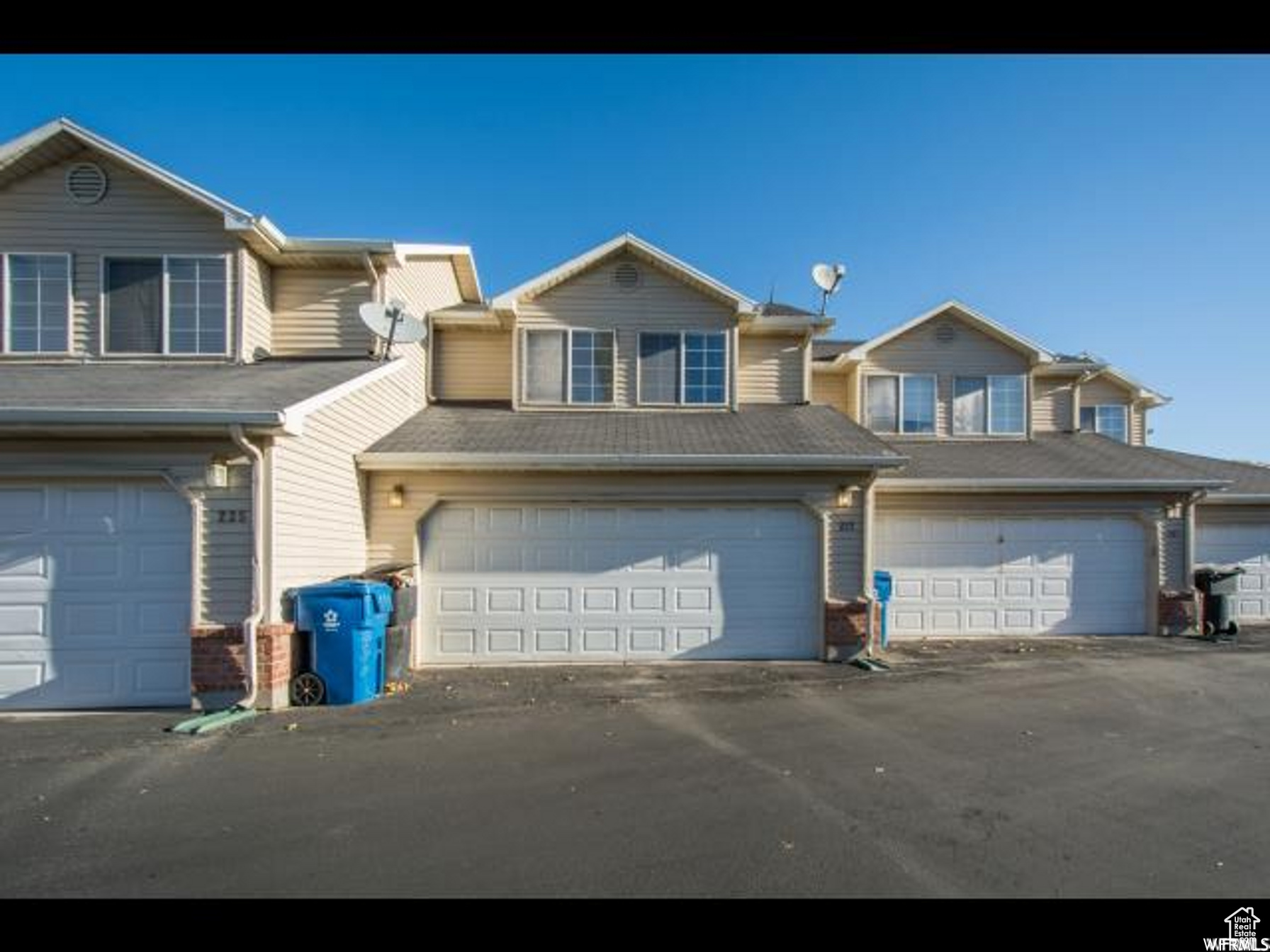 View of front of property with a garage