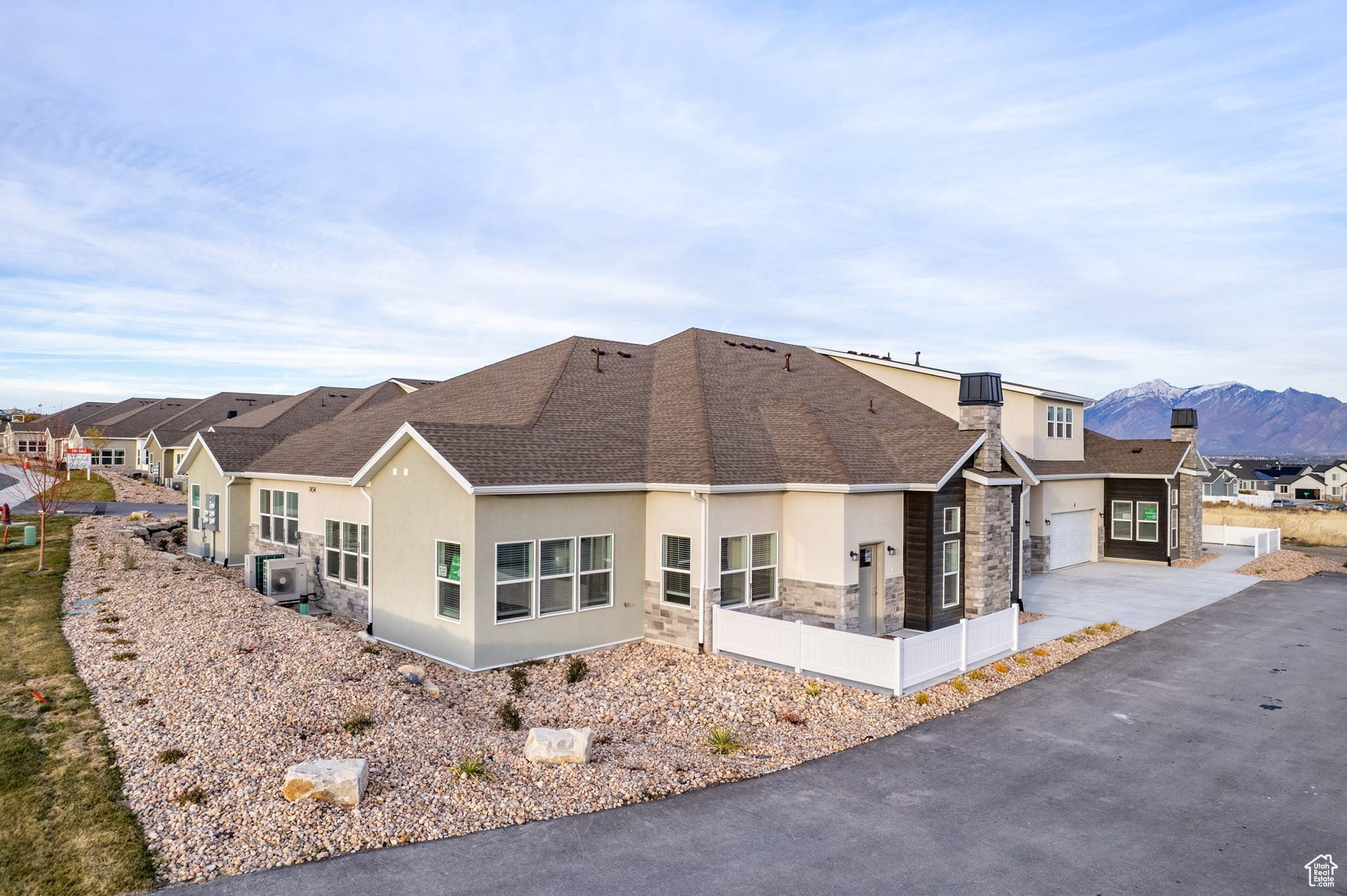 View of home's exterior with a mountain view