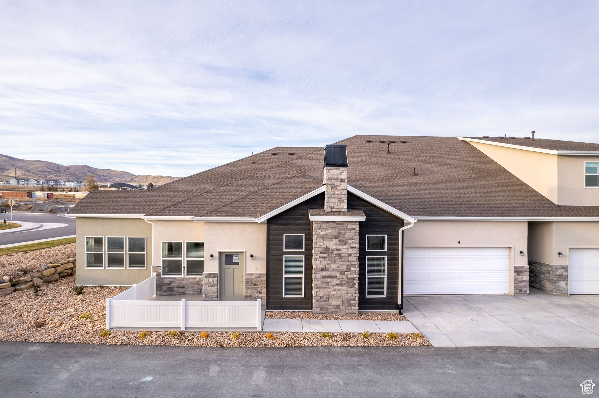 Single story home featuring a mountain view