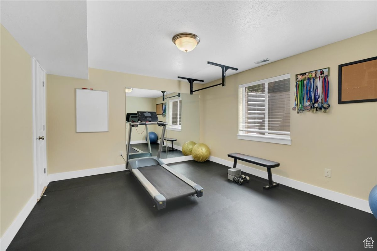 Bedroom being used as a gym