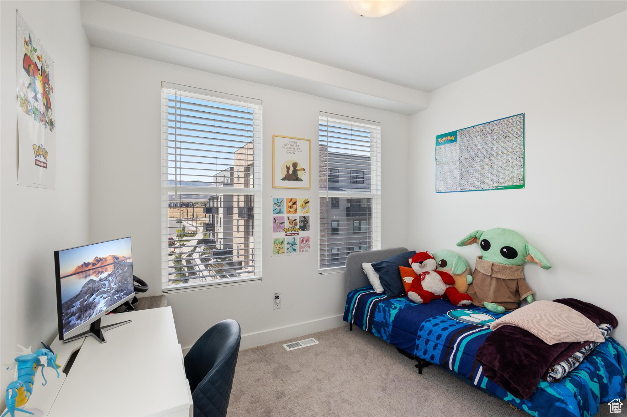 Bedroom with light carpet