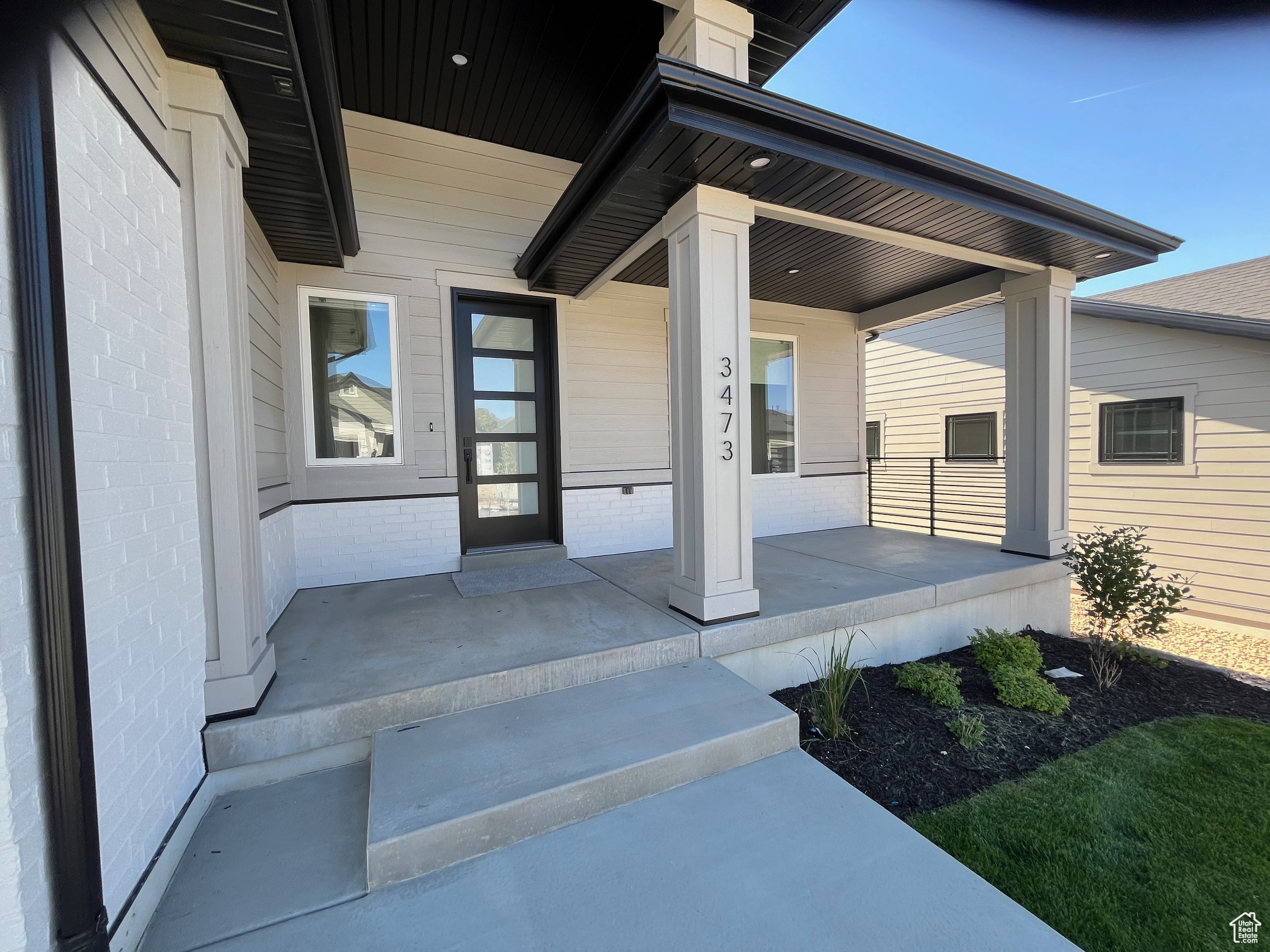 Property entrance with a porch