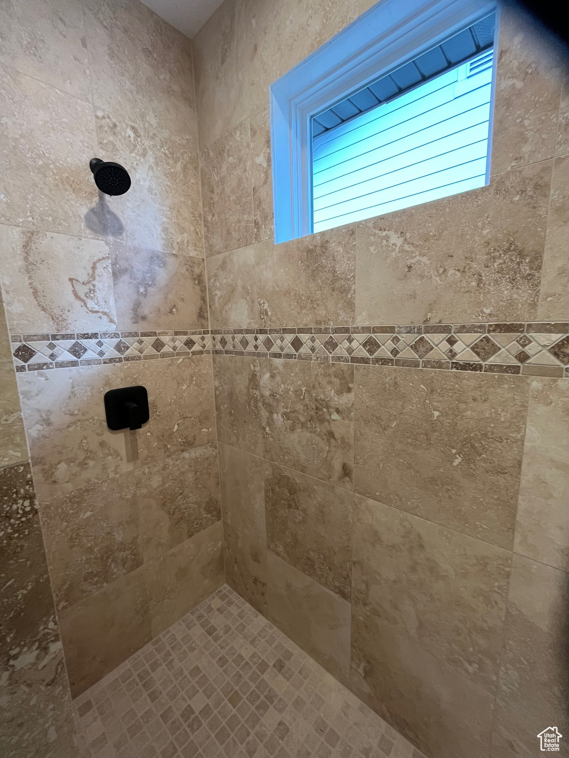 Bathroom with tiled shower