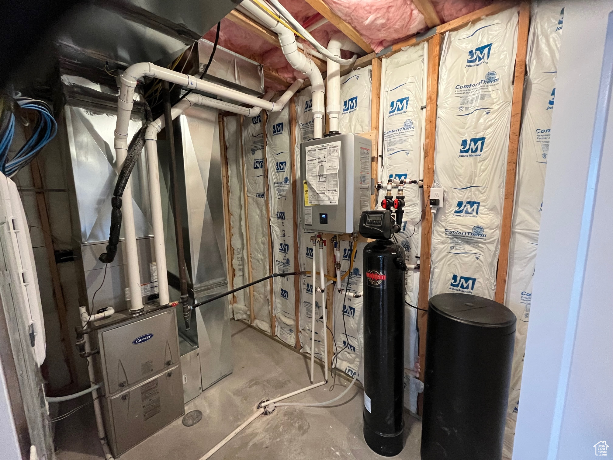 Utility room with tankless water heater