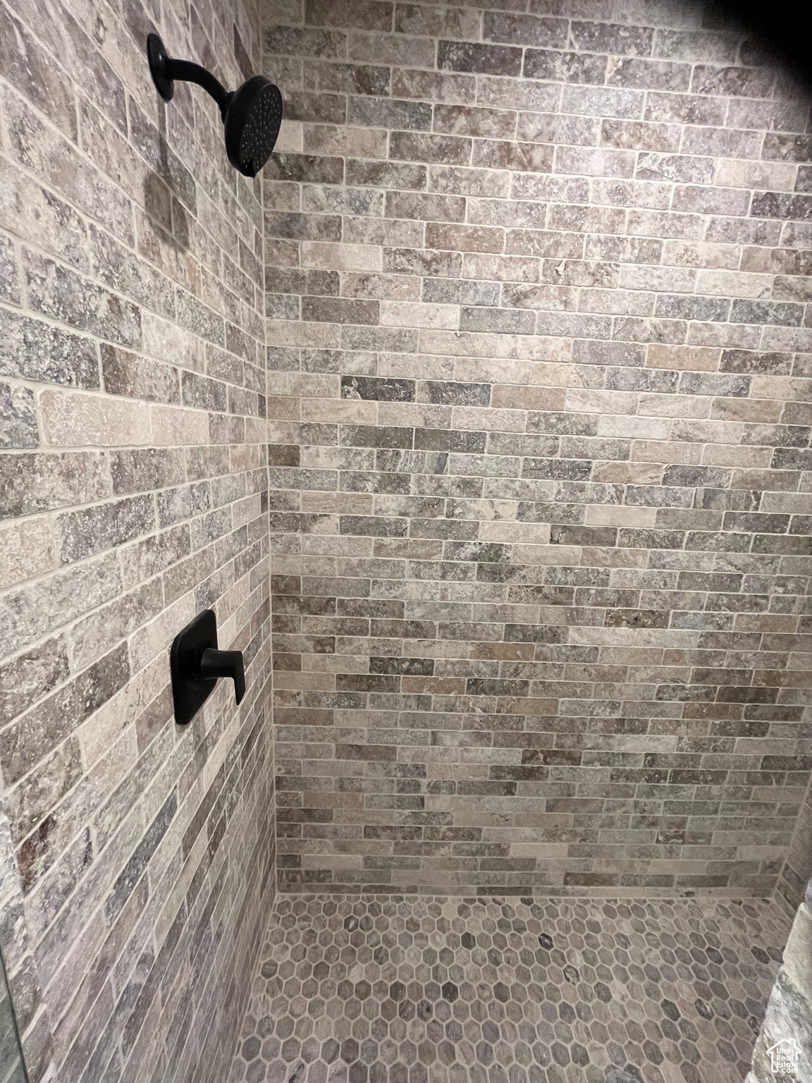 Details with a tile shower