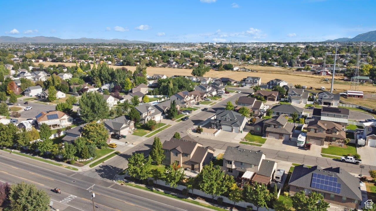 Birds eye view of property with a mountain view