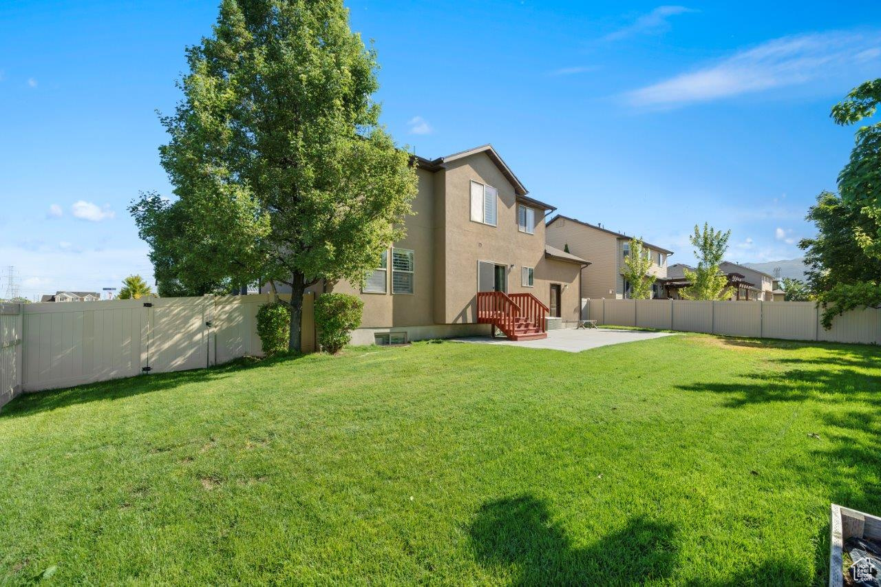 View of yard featuring a patio