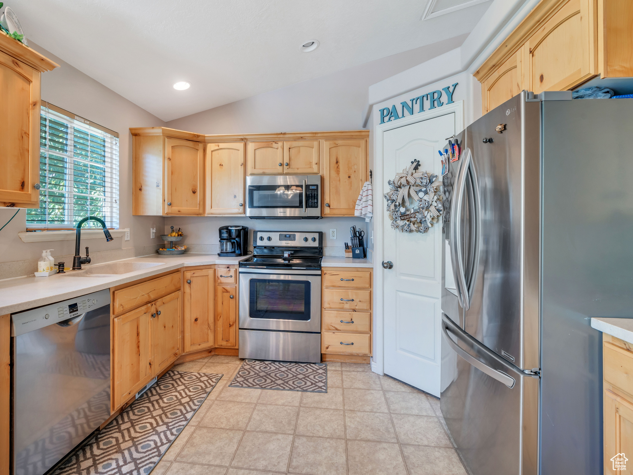 Kitchen featuring appliances with stainless steel finishes