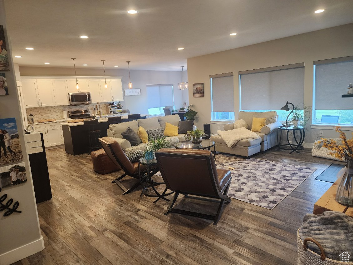 Living room with hardwood / wood-style floors