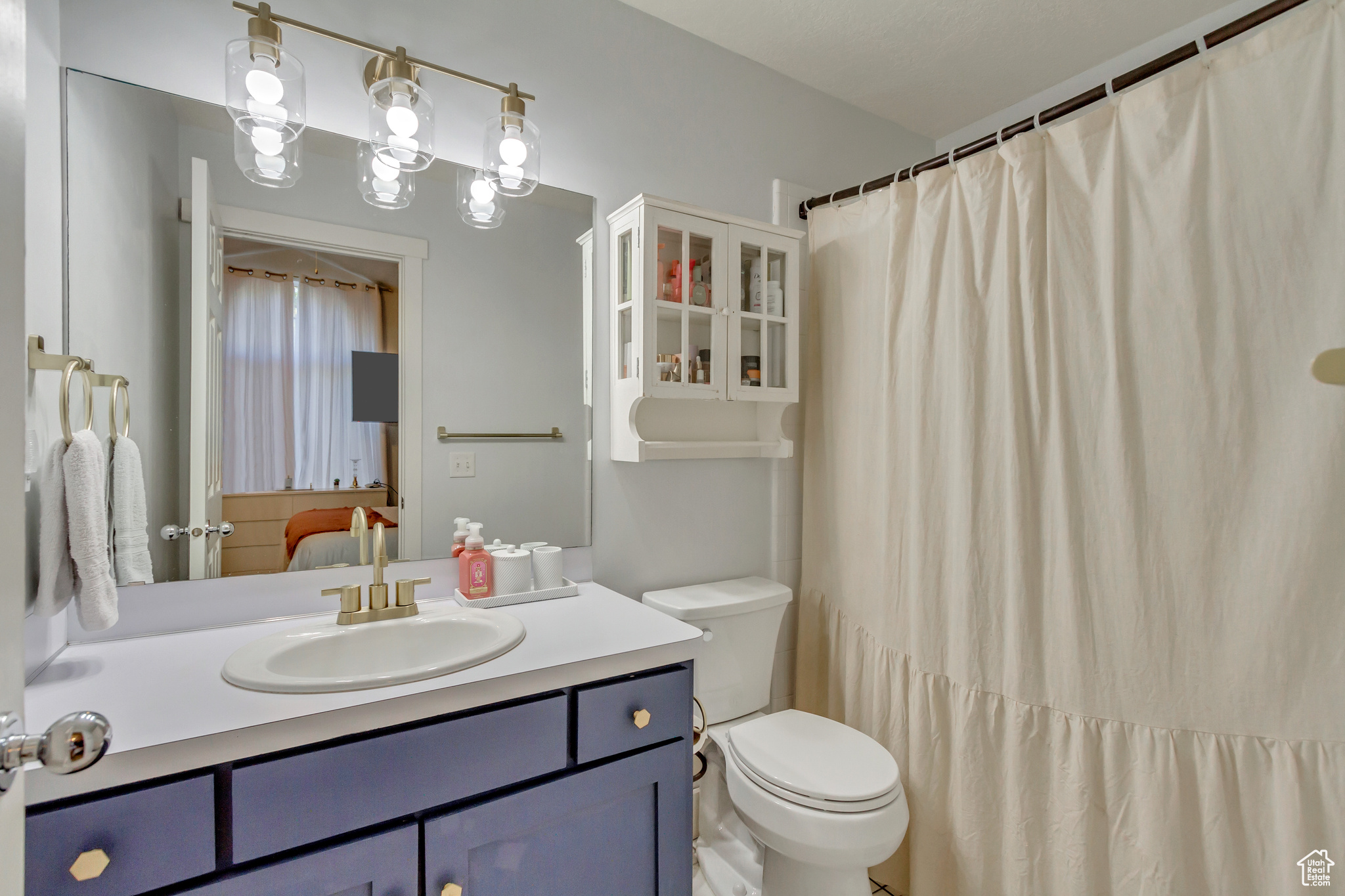 Bathroom with toilet and vanity