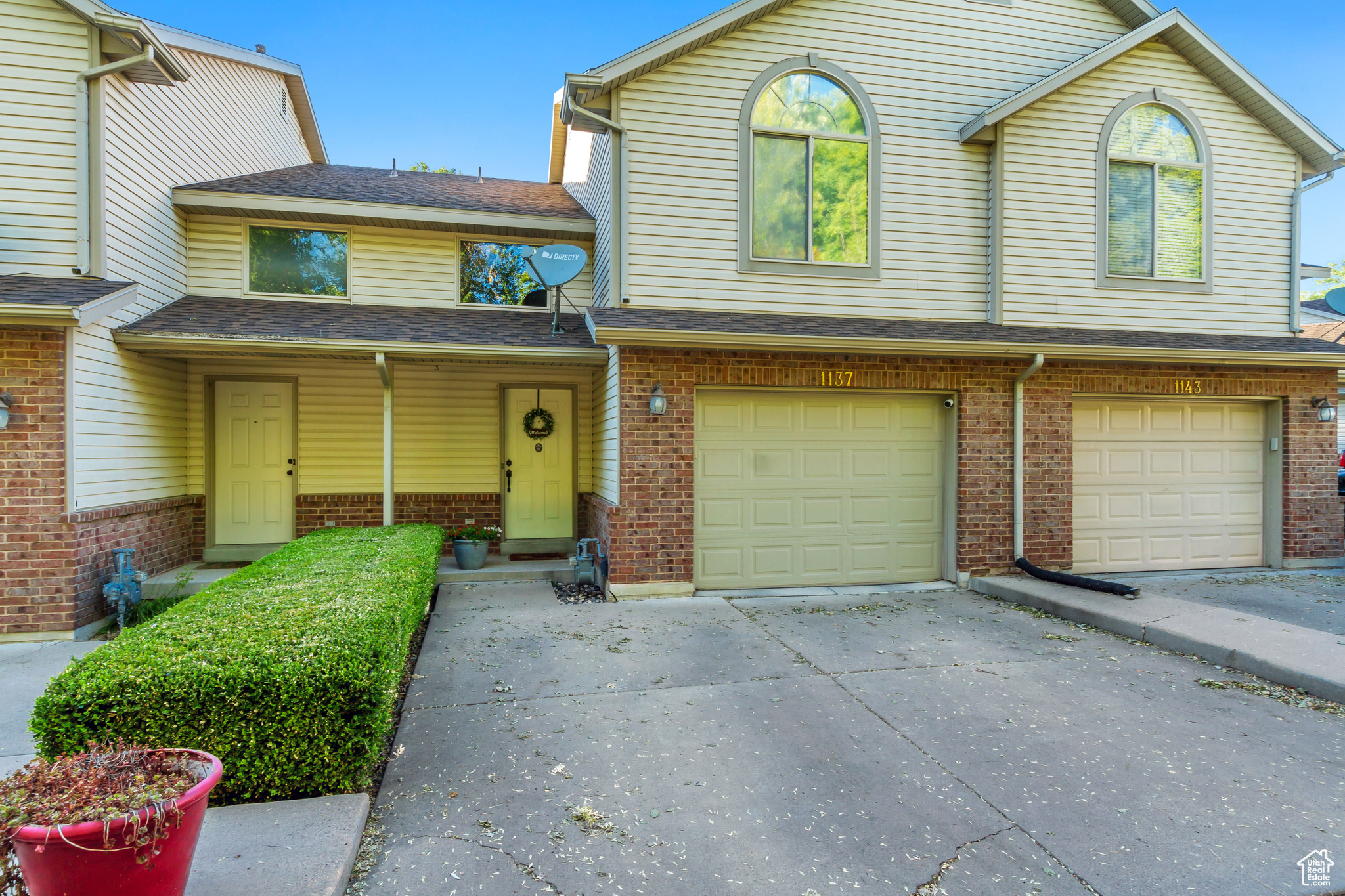 View of front of property featuring a garage