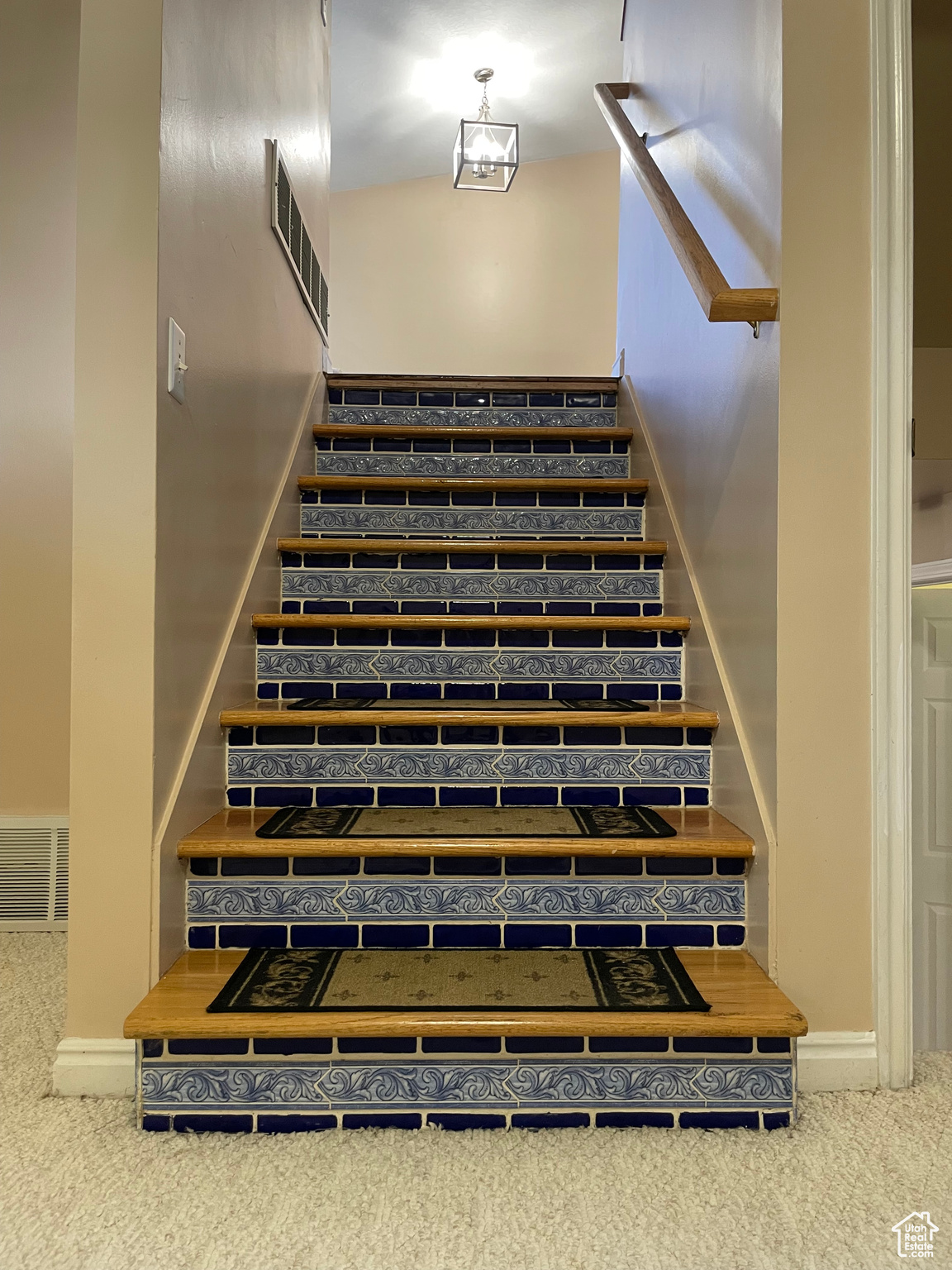 Beautiful Solid Wood Stairs w/ Custom Blue Tile Riser Facing.