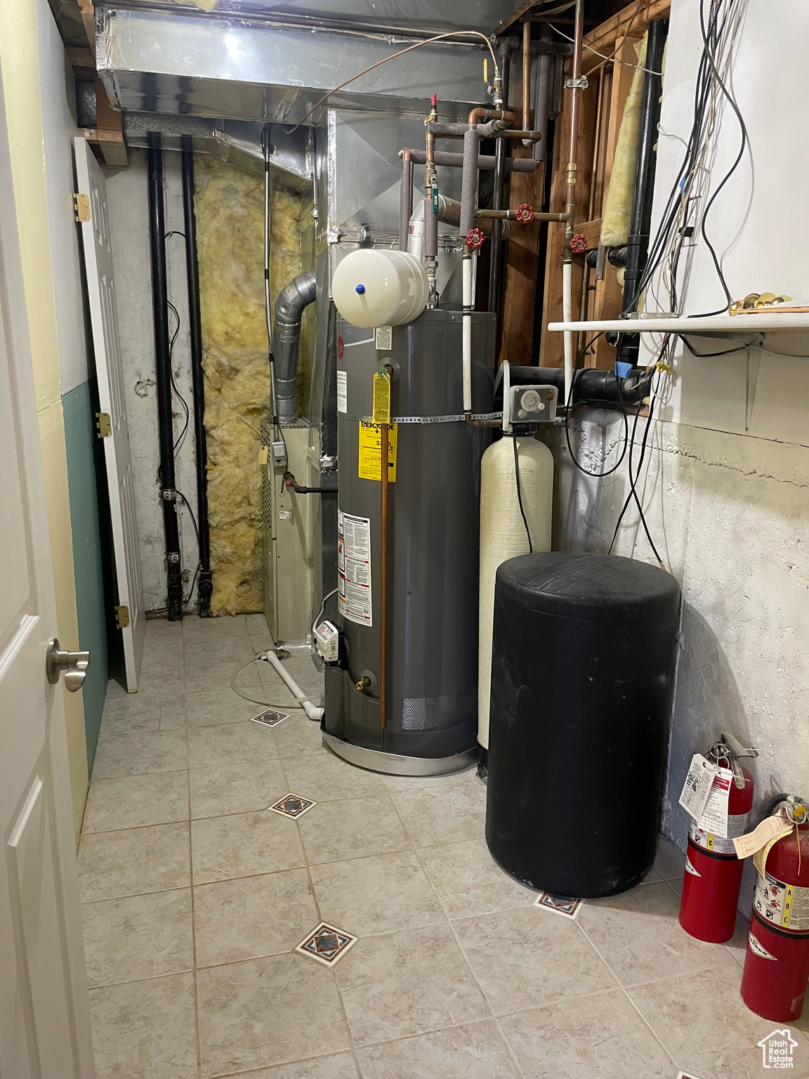 Mechanical room is well placed, maintained equipment, with Water Softener. Tiled floor and some Storage space. Great location for a Mechanical Rm.