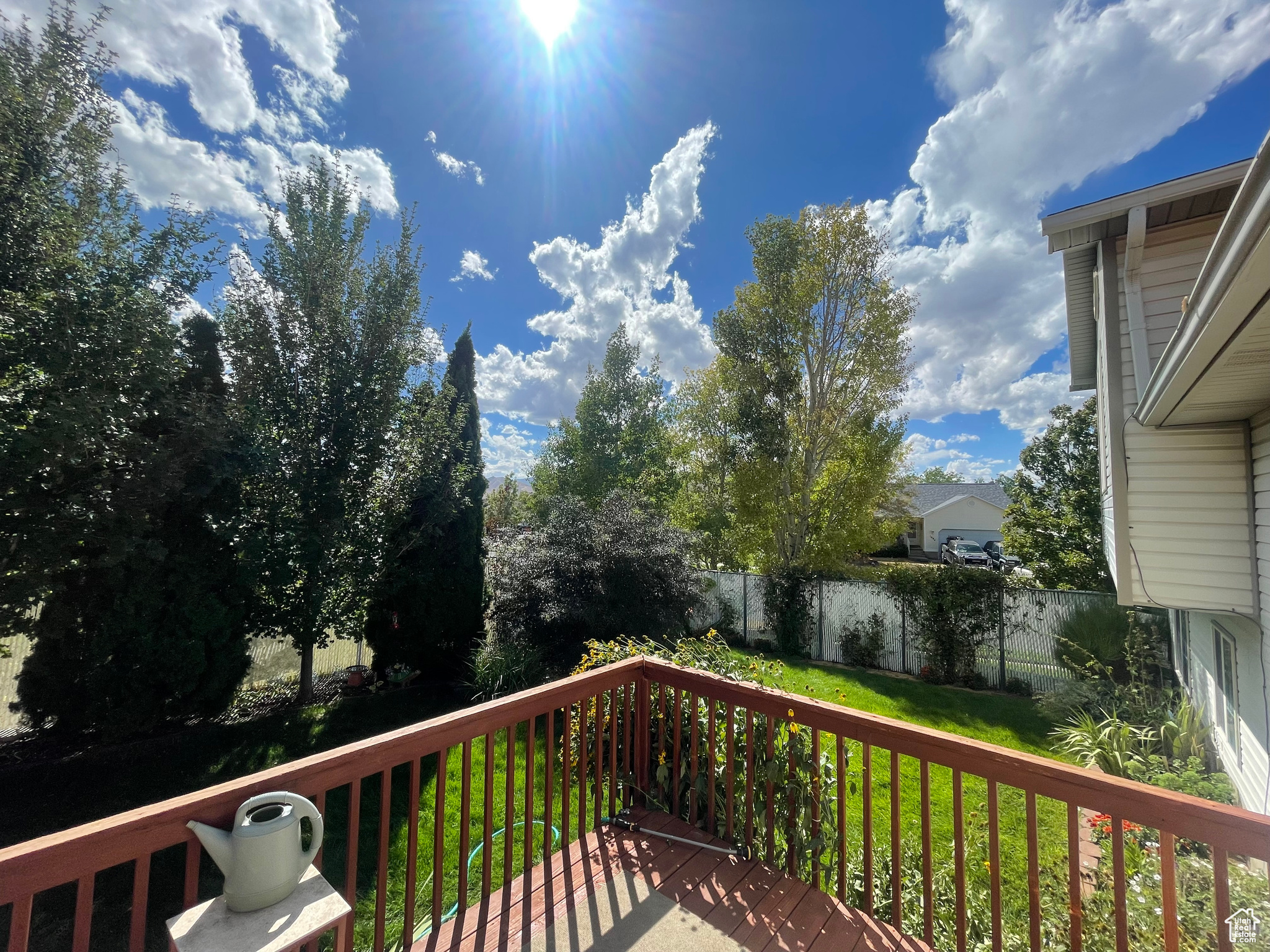 Views off Back Deck looking South West, yeah you ca see sky and trees with Deseret Peak in the distance.