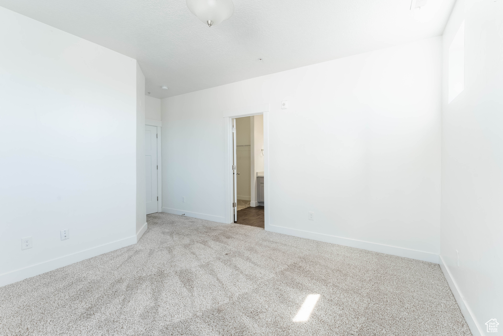 Spare room with carpet floors