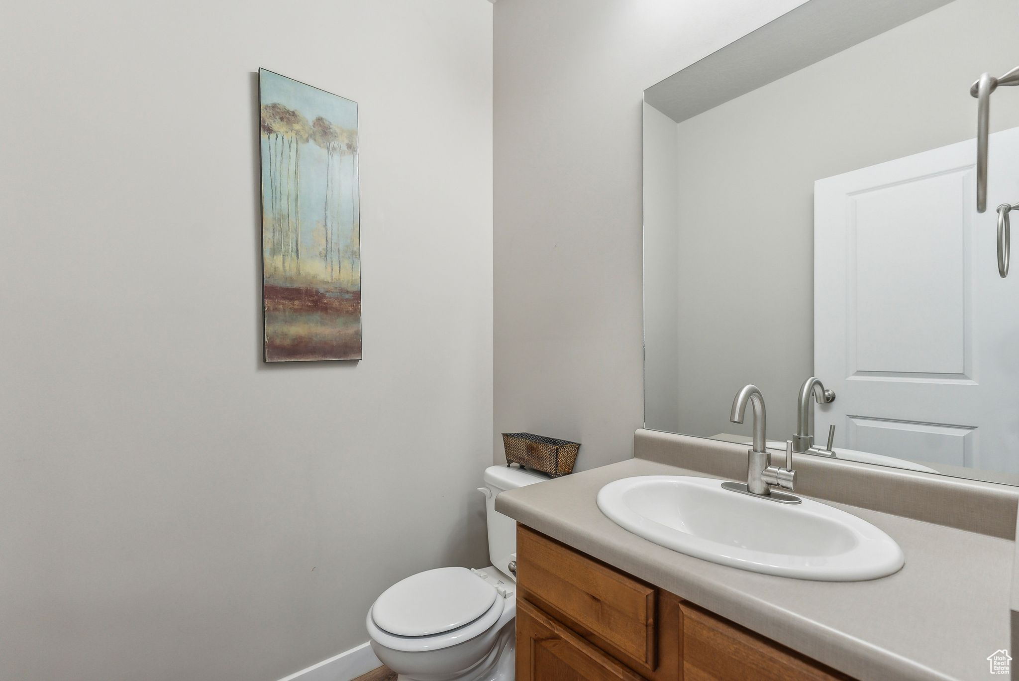 Bathroom with toilet and vanity