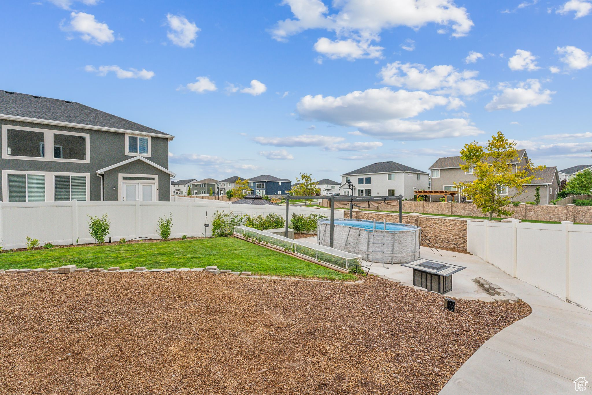 View of yard featuring a fenced in pool