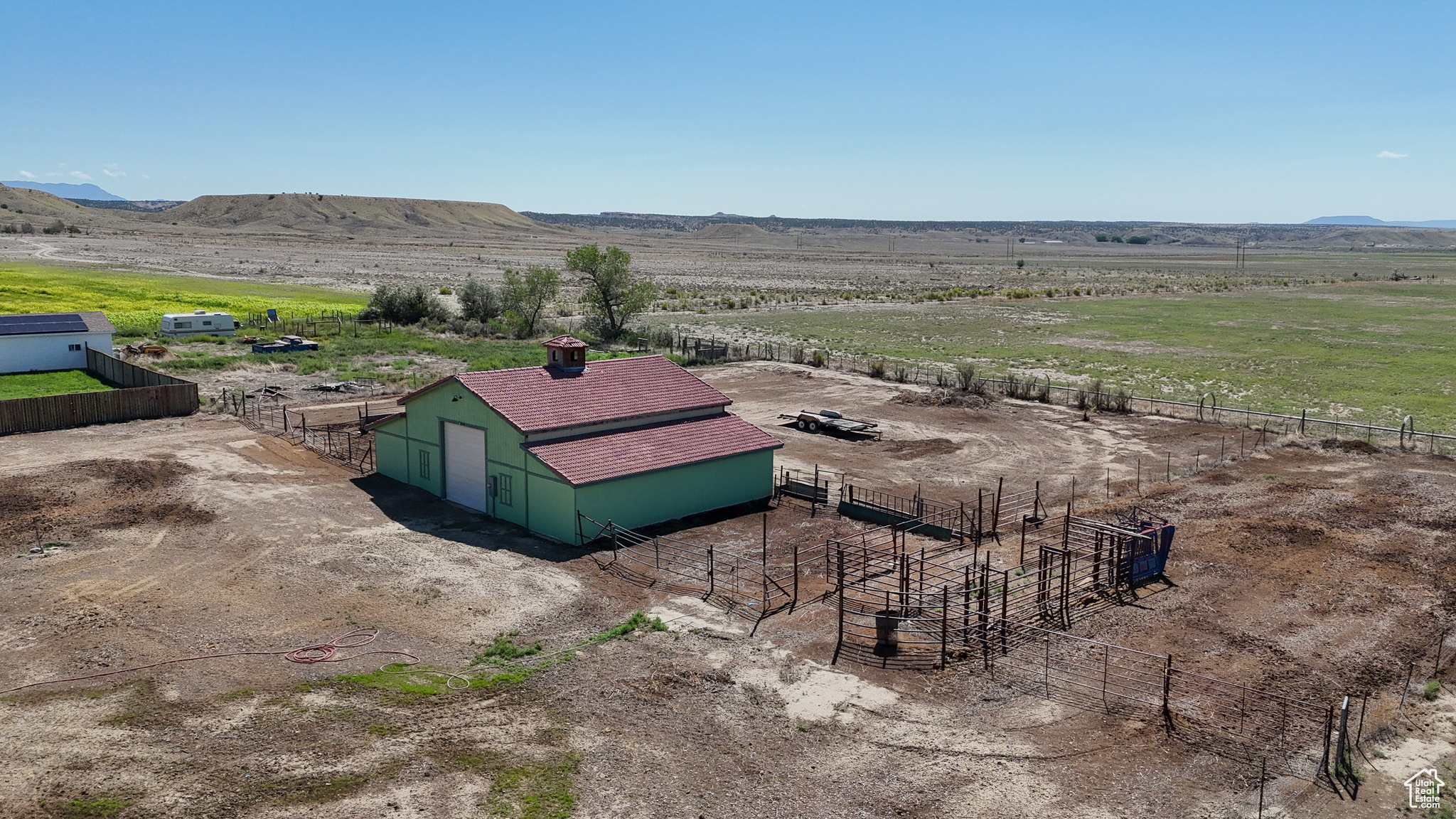 Birds eye view of property featuring a rural view