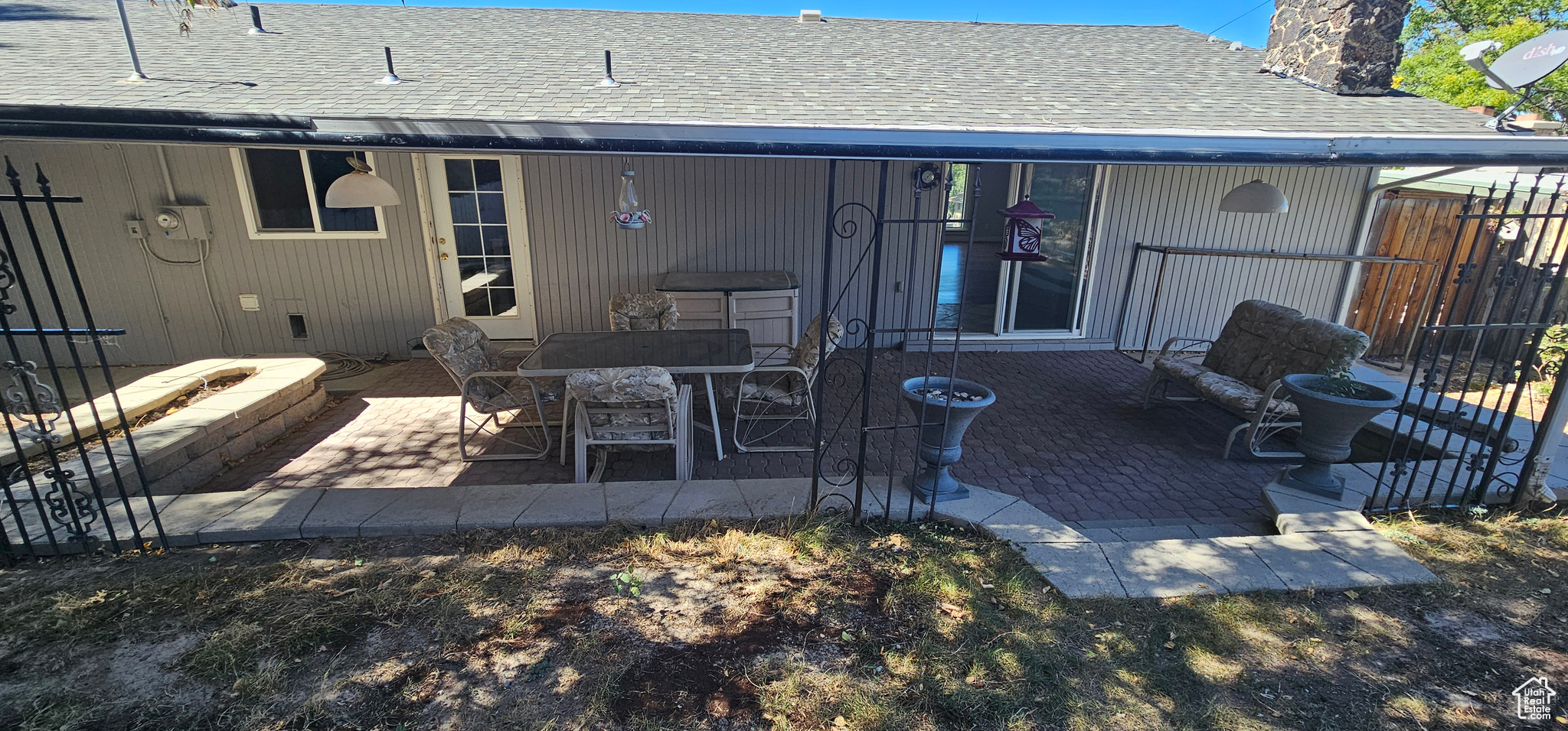 Rear view of property featuring a patio area