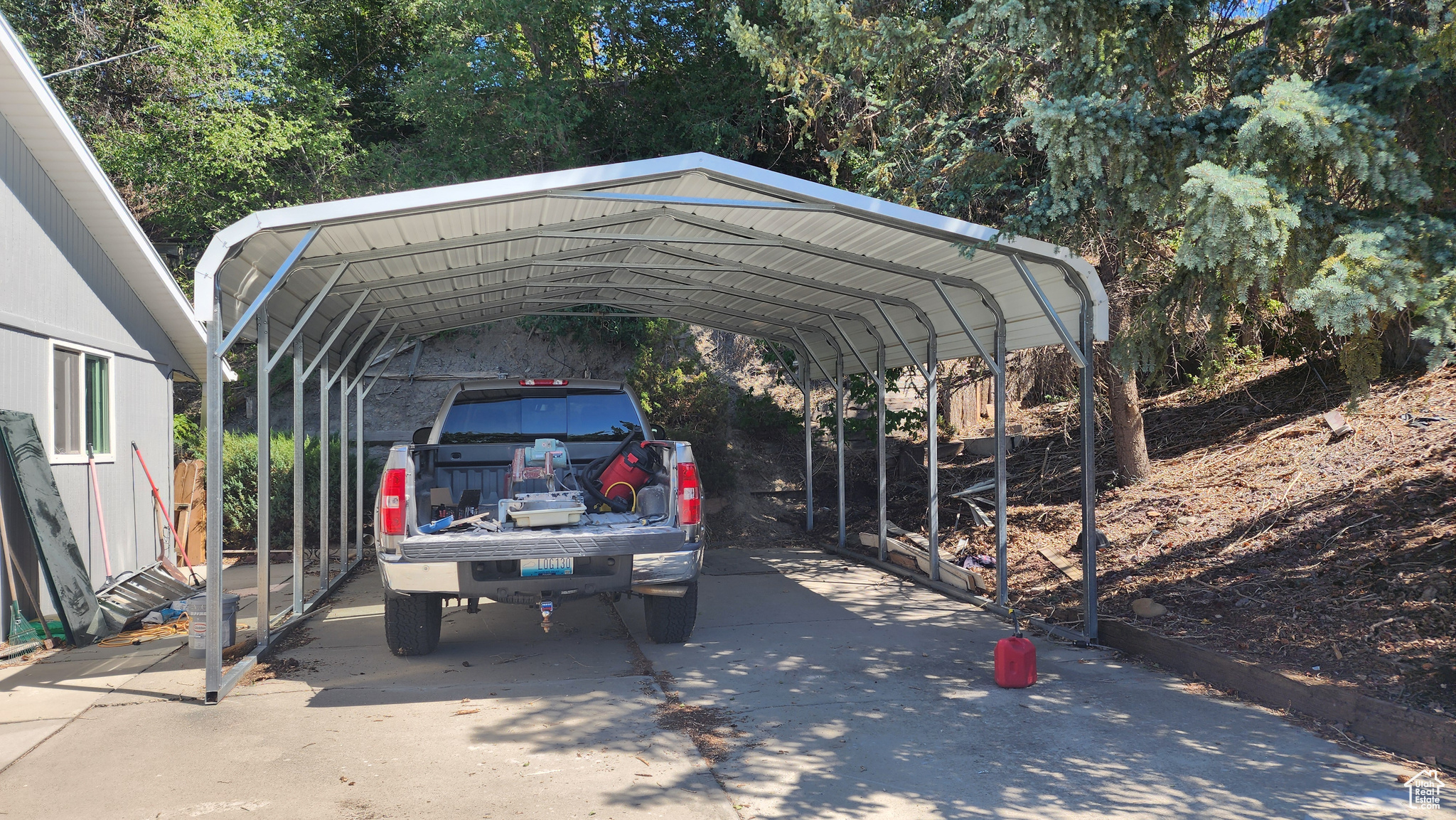 View of car parking with a carport