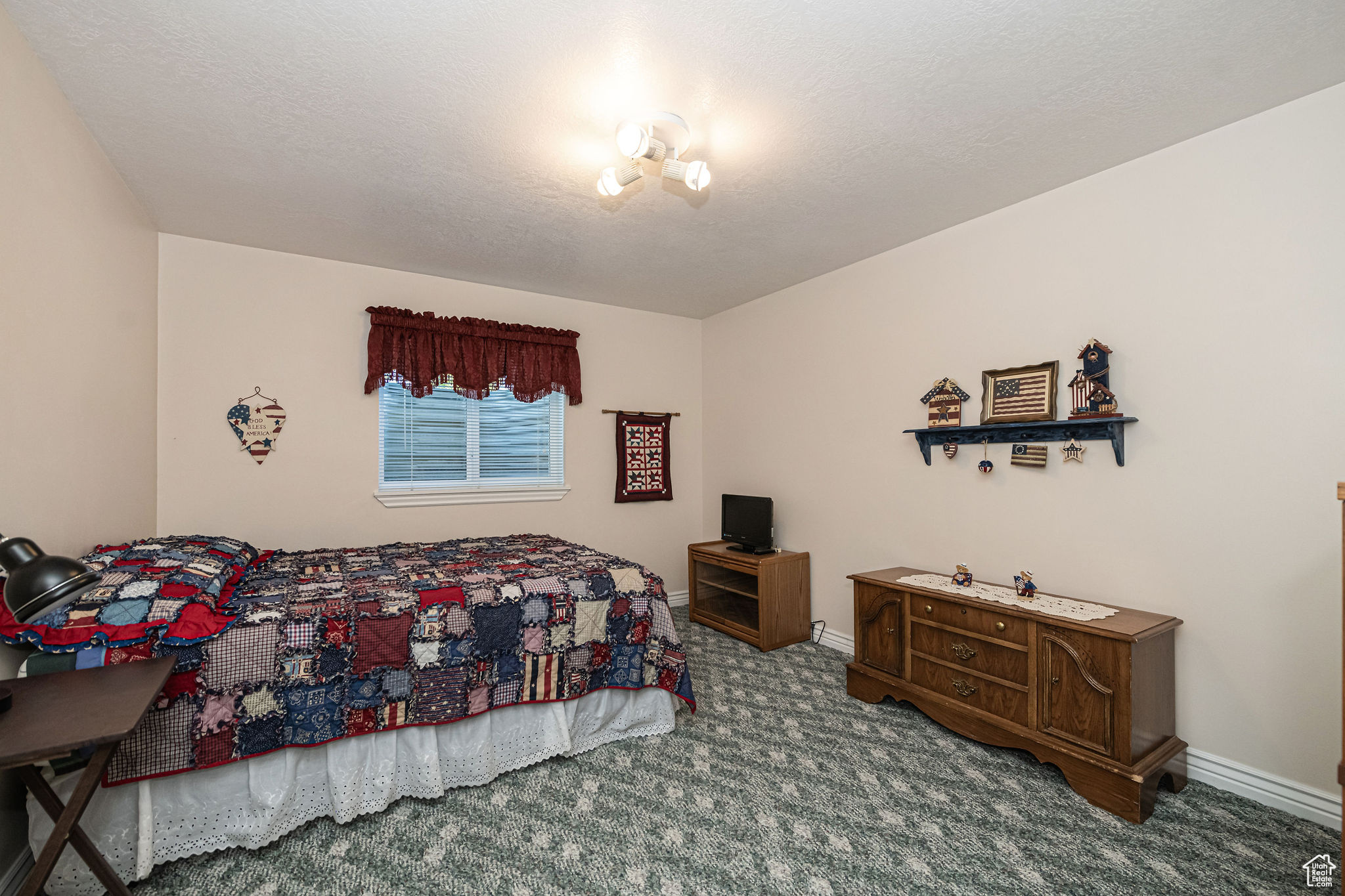 View of carpeted bedroom