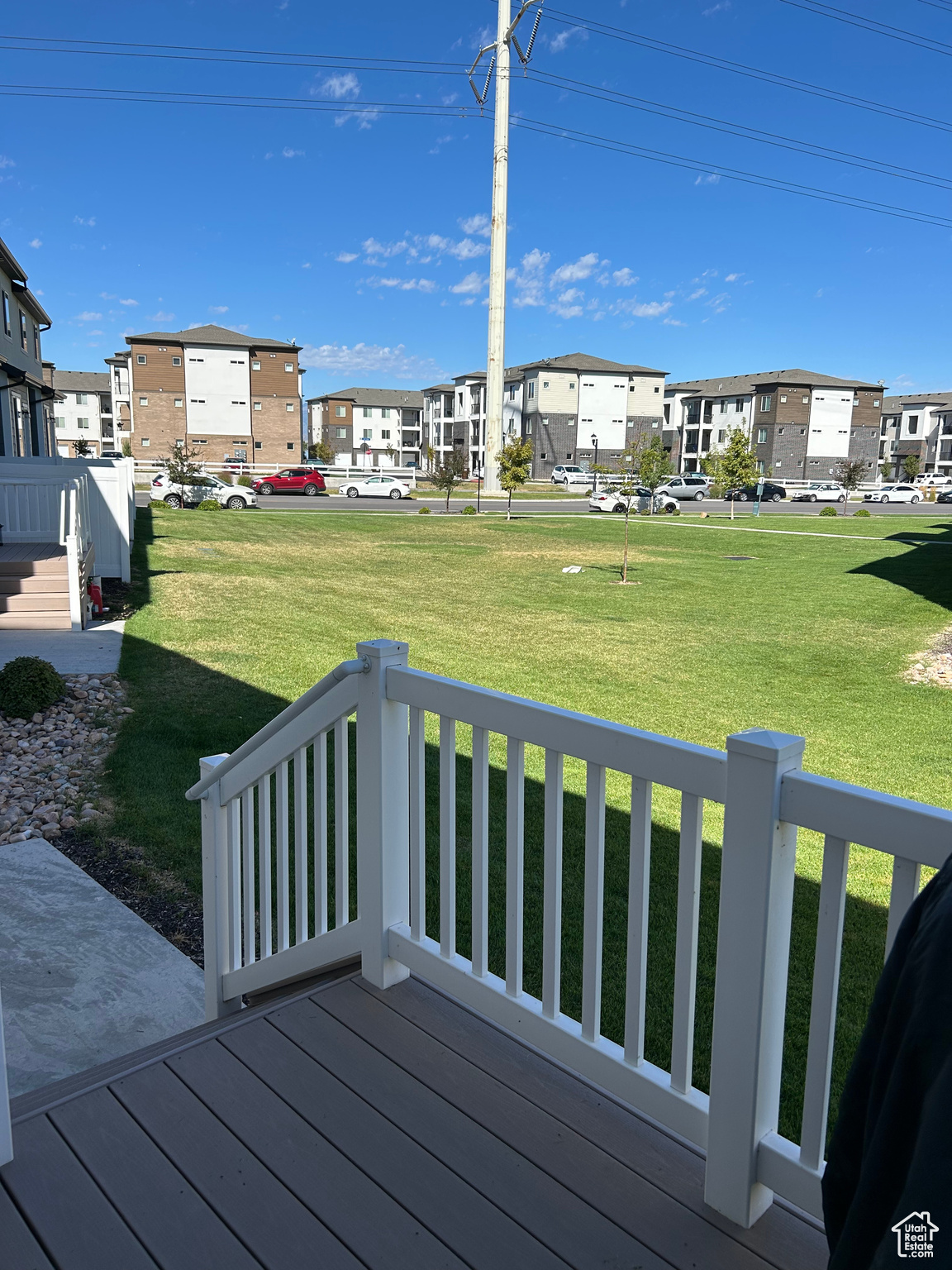 Wooden terrace with a yard